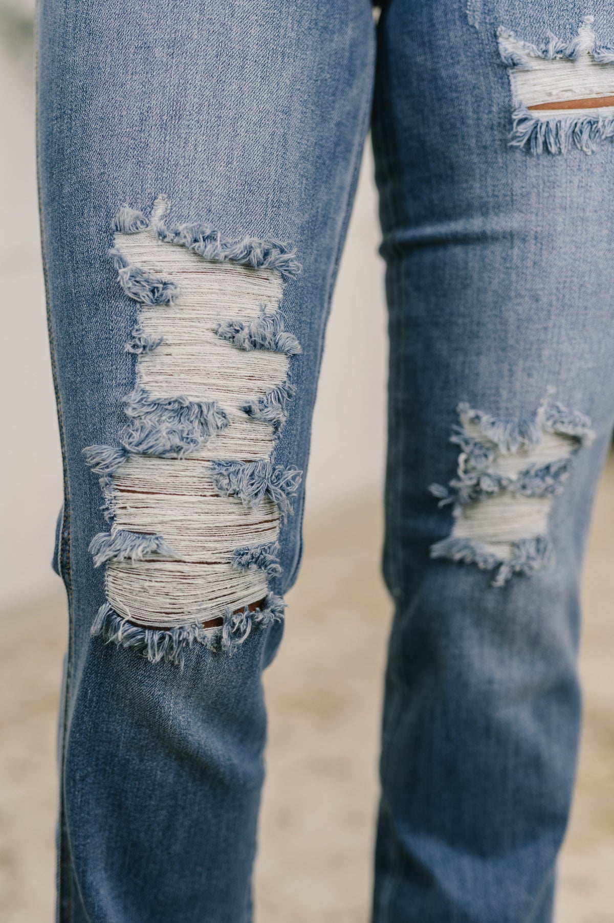 Maureen High Rise Distressed Bootcut Jeans